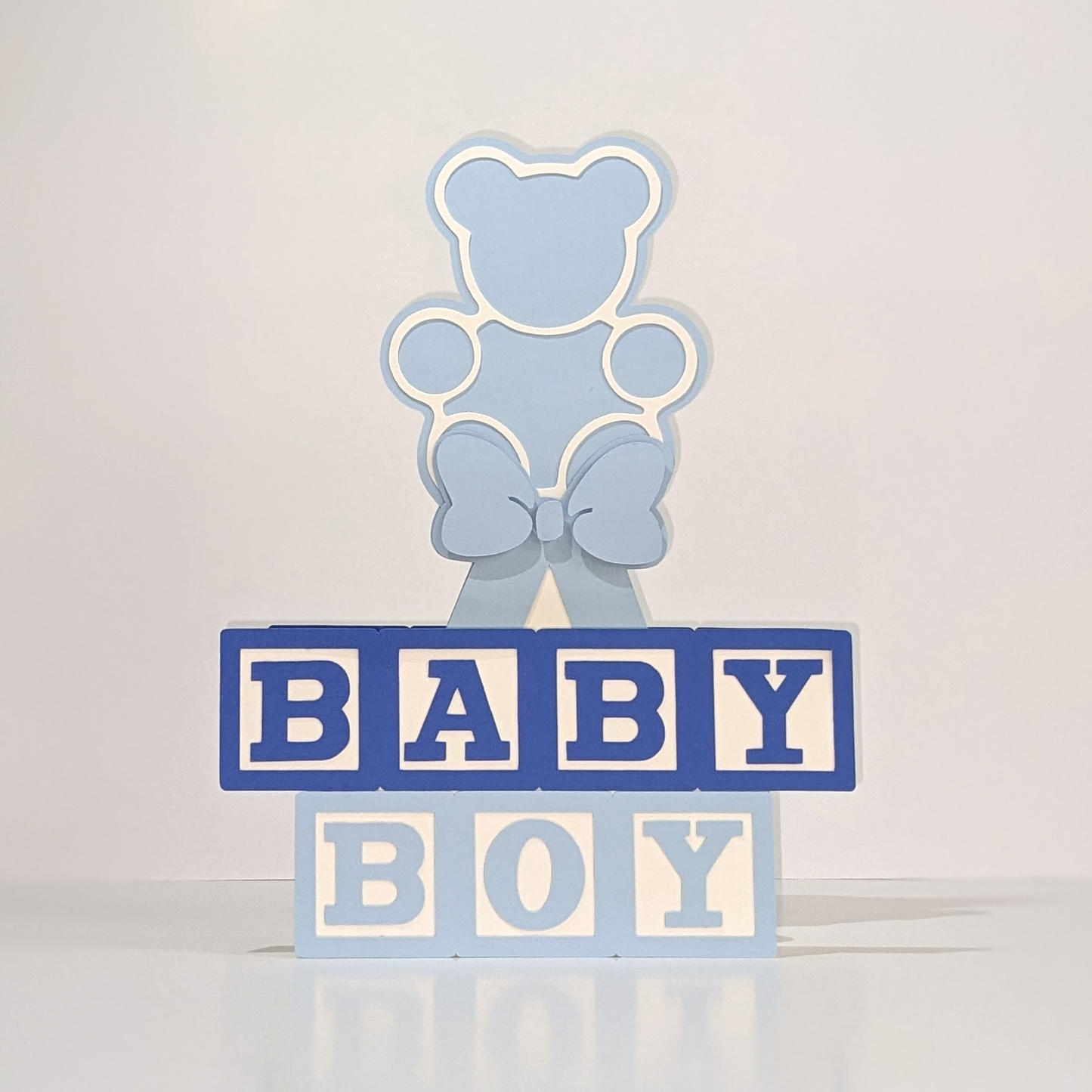 teddy bear baby shower centerpiece. baby shower centerpieces. cardstock baby shower decorations. pop-up baby shower centerpieces. pink baby shower decor. blue baby shower decor. gender reveal decorations. handmade baby shower centerpieces. baby table decorations