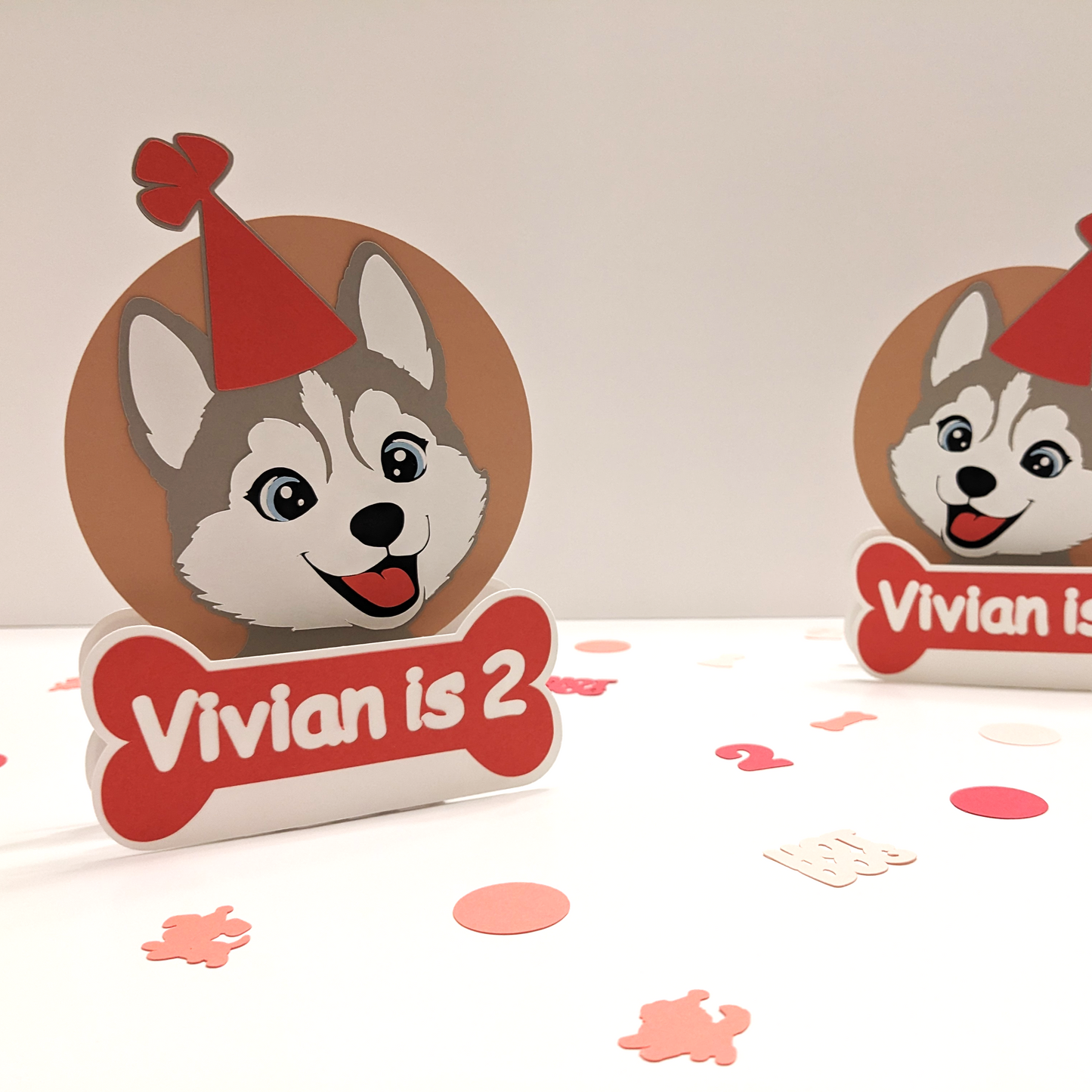 Dog Birthday party. Custom dog-themed birthday decorations handmade in cardstock. Includes personalized banner, centerpieces, confetti, and signs for an easy party setup.